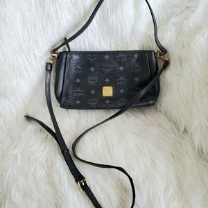 MCM two way sling bag.